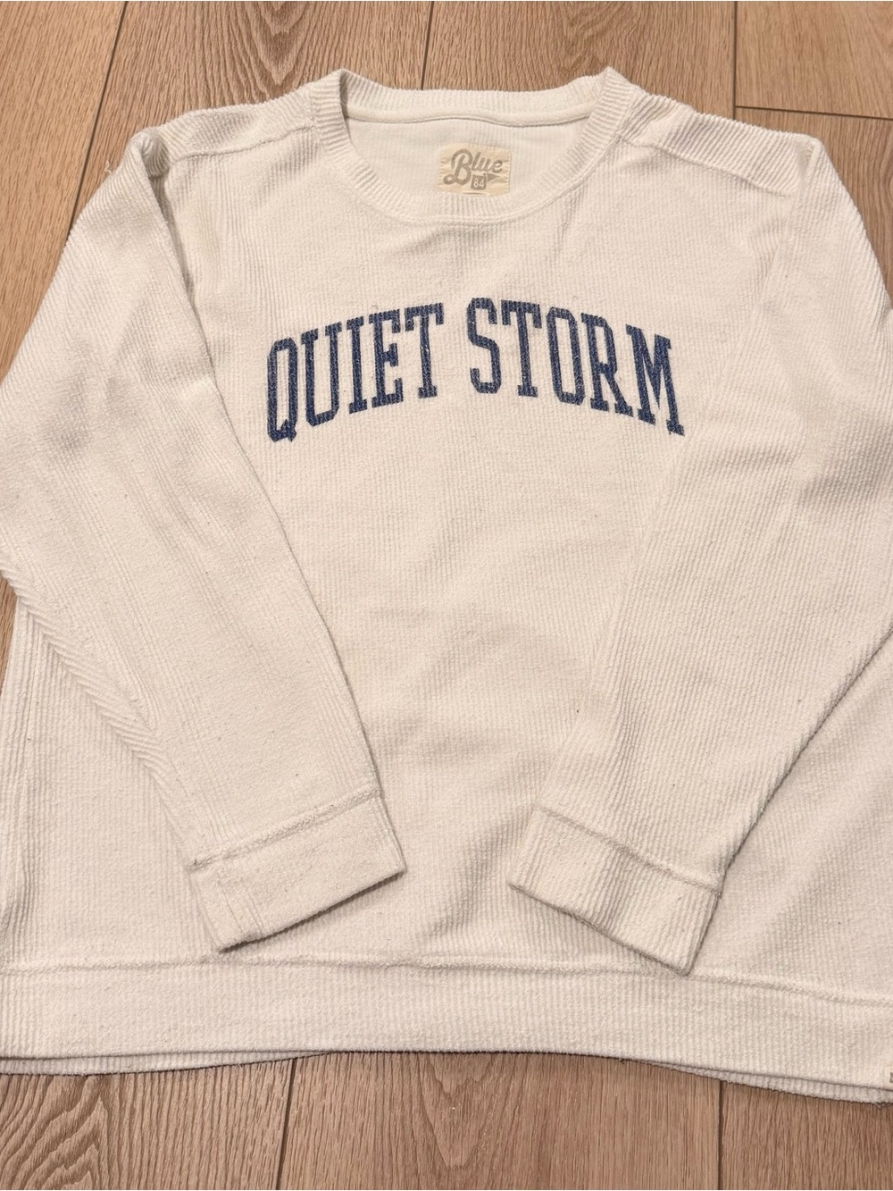 Blue 84 Cream Crewneck with Blue "Quiet Storm" Chest Print